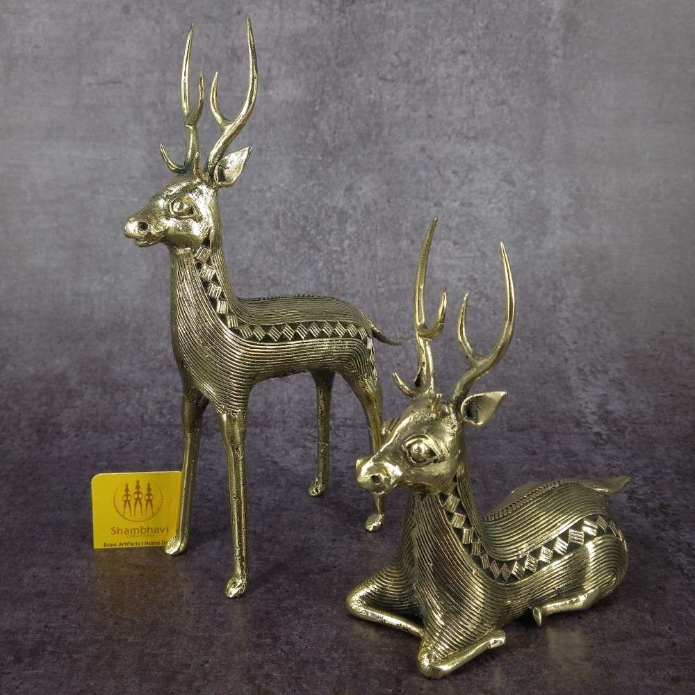 Brass deer pair Dokra art figurines with detailed antlers captured in studio lighting for premium home decor display