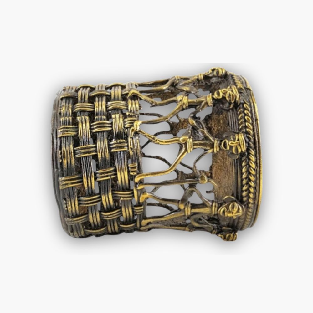 Side view of Bastar Dokra art brass pen holder with marching figures design