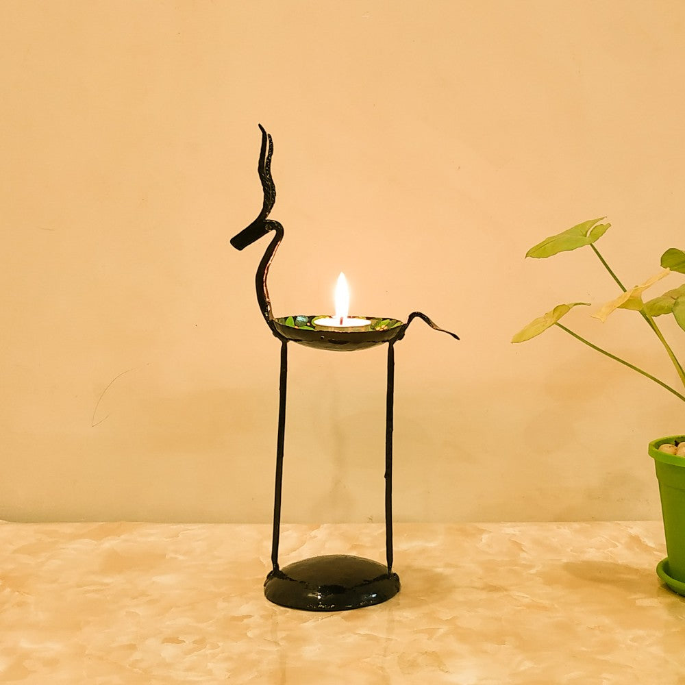 Artisan crafted iron deer candle holder side angle