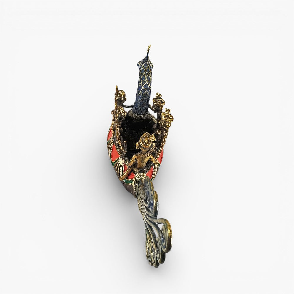 Back top view of handcrafted Bastar art brass peacock boat statue showing peacock neck detailing and fisherman arrangement