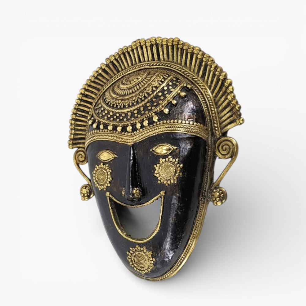 Handcrafted Bastar art ornamented brass mask in bronze finish showcasing intricate Dhokra detailing and traditional Indian design
