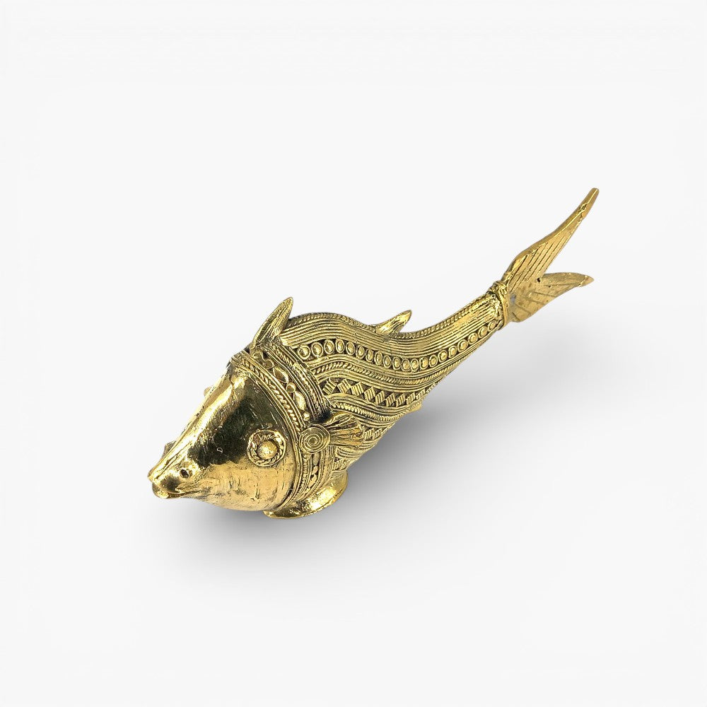 Angled perspective of handcrafted Bastar Dhokra brass fish figurine emphasizing fluid curves and intricate scaly texture