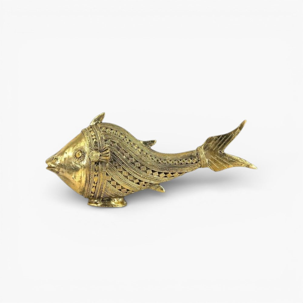 Handmade Bastar Dhokra brass fish figurine with detailed scales captured in full length side view on white background