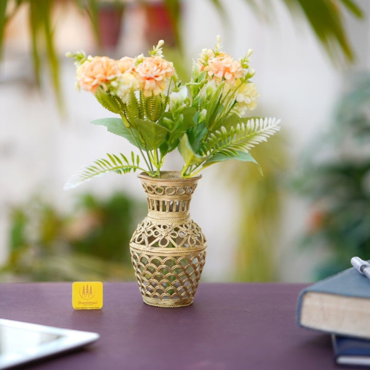 Handcrafted Bastar Dokra art brass strips motif flower vase styled on a table with floral arrangement, showcasing golden finish and elegant handcrafted detailing