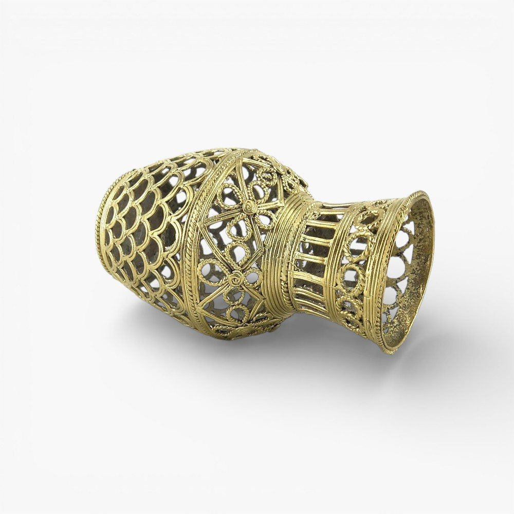 Bastar Dokra art handcrafted brass strips motif flower vase displayed in a side angle view, showcasing lattice-style metalwork and detailed rim design