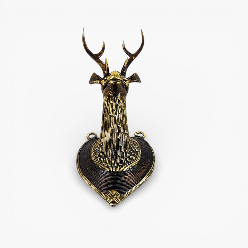 Handcrafted brass deer head wall decor angled view