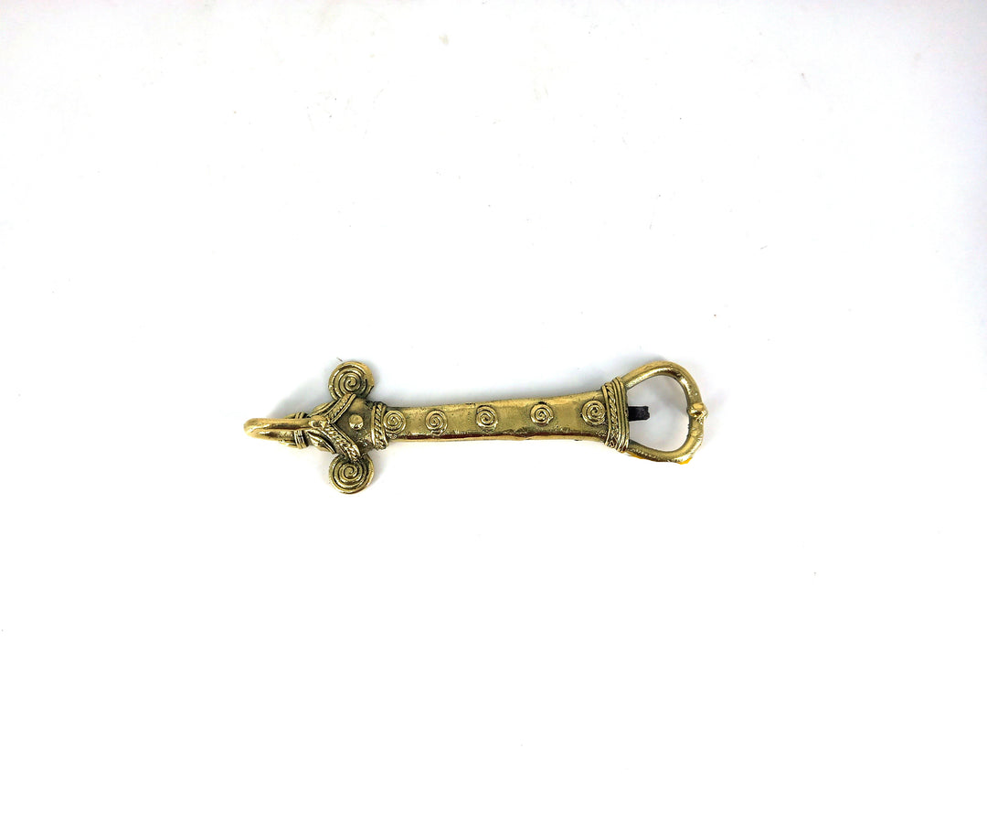 Side view of Bastar Dokra art brass bottle opener