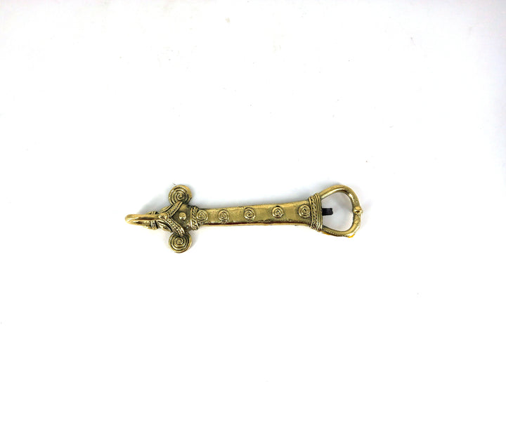 Side view of Bastar Dokra art brass bottle opener