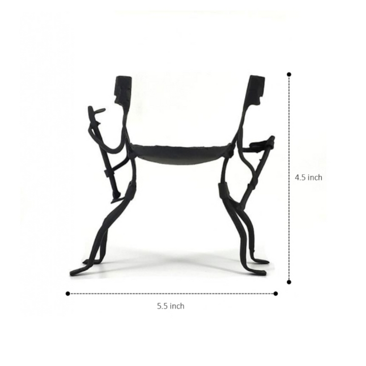 Minimal black iron tea light holder with symbolic human form