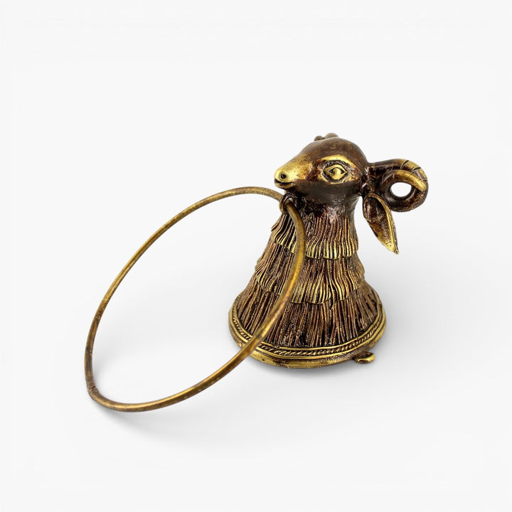 Side view of Bastar Dokra art brass lamb towel ring