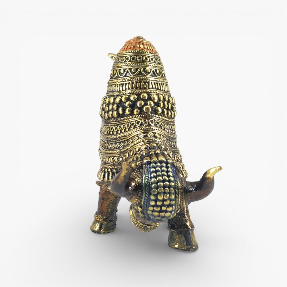 Bastar Dokra brass raging bull statue handcrafted tribal art decor displayed on table