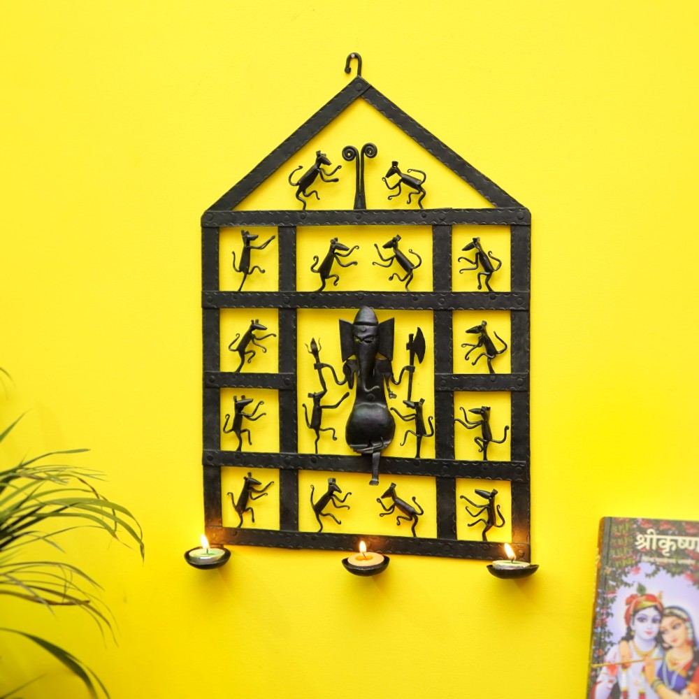 Handcrafted Bastar iron art Ganesha wall hanging black metal tribal wall decor with tea light holders lifestyle display