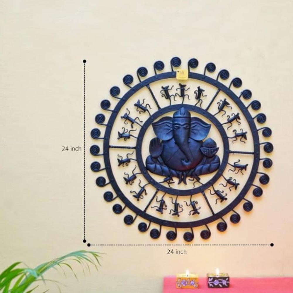 Handcrafted Bastar iron art round Ganesha wall hanging with visible dimensions, photographed front-on to show detailed ironwork and balanced circular form