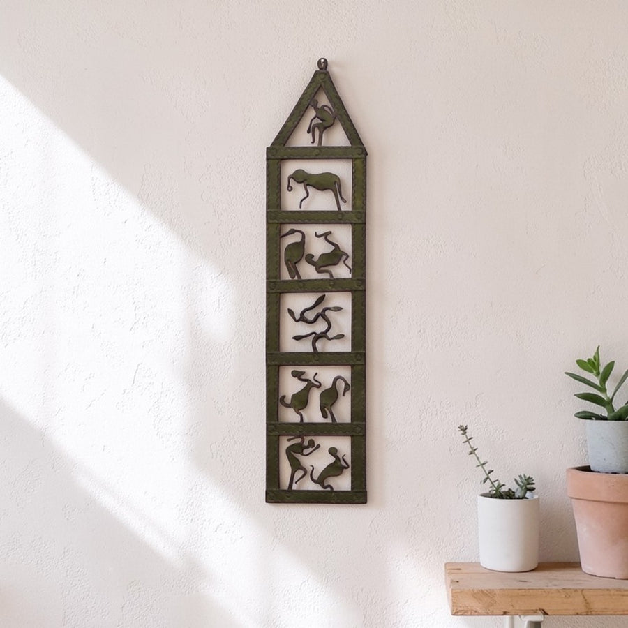 Handcrafted Bastar iron art man and nature harmony wall panel black metal tribal wall decor lifestyle setting