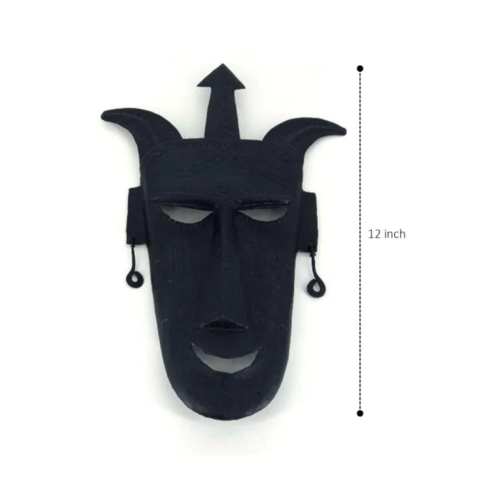 Front view of handcrafted Bastar iron art trident mask wall hanging showing 12 inch height and traditional tribal iron craftsmanship