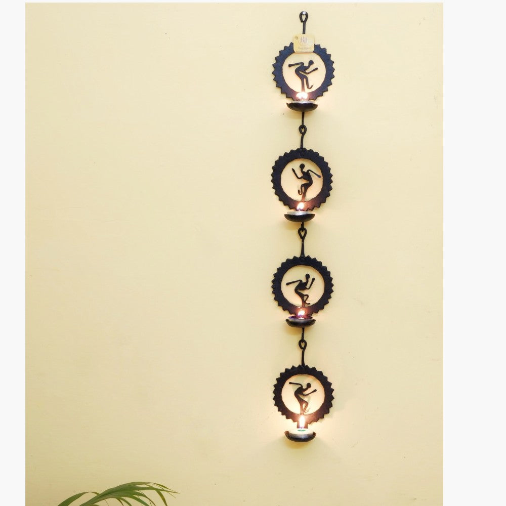 Handcrafted Bastar iron craft circle tea light wall hanging black metal tribal wall decor close view