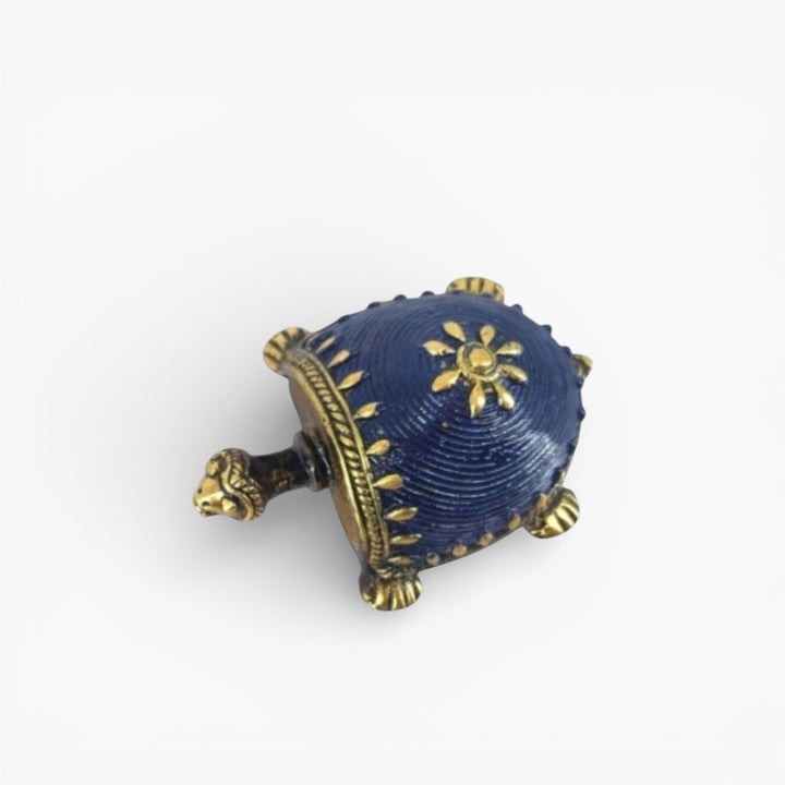 Handcrafted Dhokra art bell metal turtle figurine in blue color showing detailed shell pattern and traditional Bastar metal craftsmanship