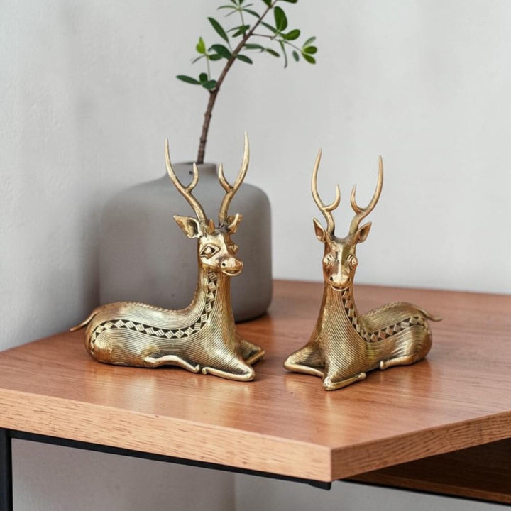Handcrafted brass bell metal art sitting deer duo golden decorative tabletop sculpture