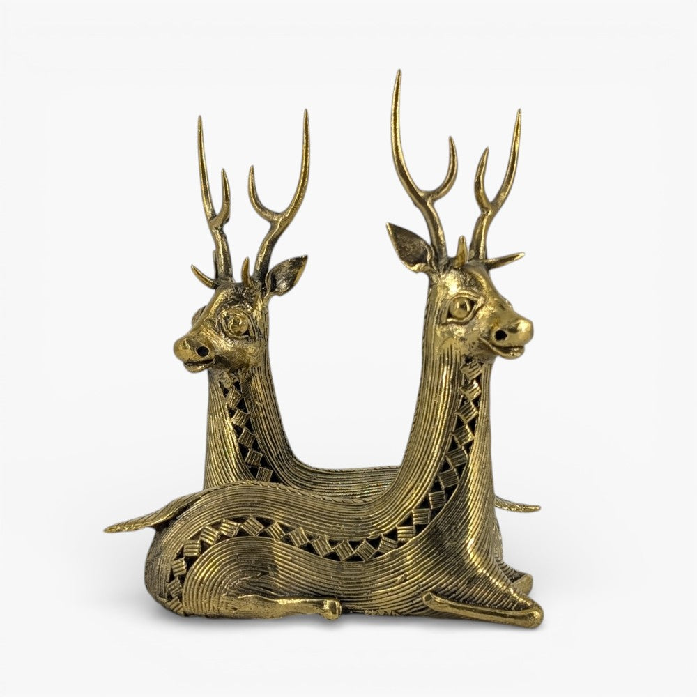 Front view of brass bell metal art sitting deer pair handcrafted in traditional Dhokra style