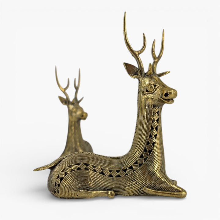 Close-up side view of handcrafted brass deer figurine in Bastar Dokra art showing detailed textured design