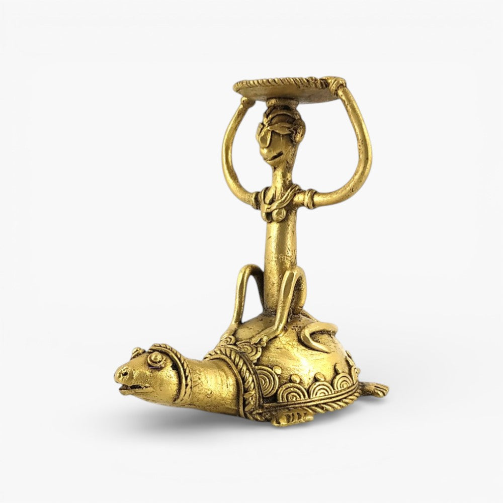 Side view of Bastar Dokra art brass candle holder