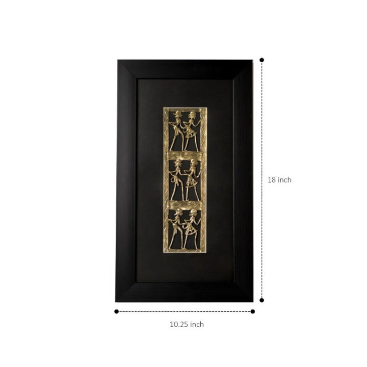 Brass Dhokra art wall hanging with black frame showing size reference of 18 inch height and 10.25 inch width