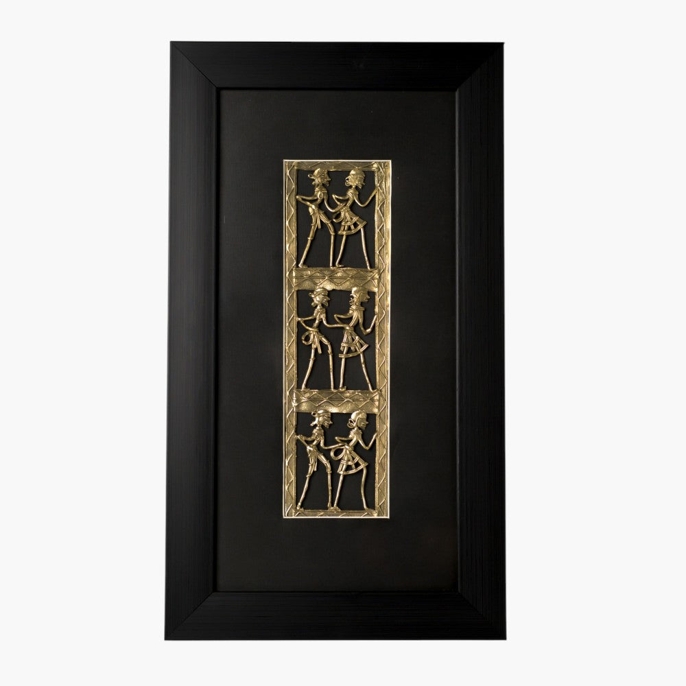 Handcrafted brass Dhokra art wall hanging framed in black showing traditional tribal figures in vertical panel design