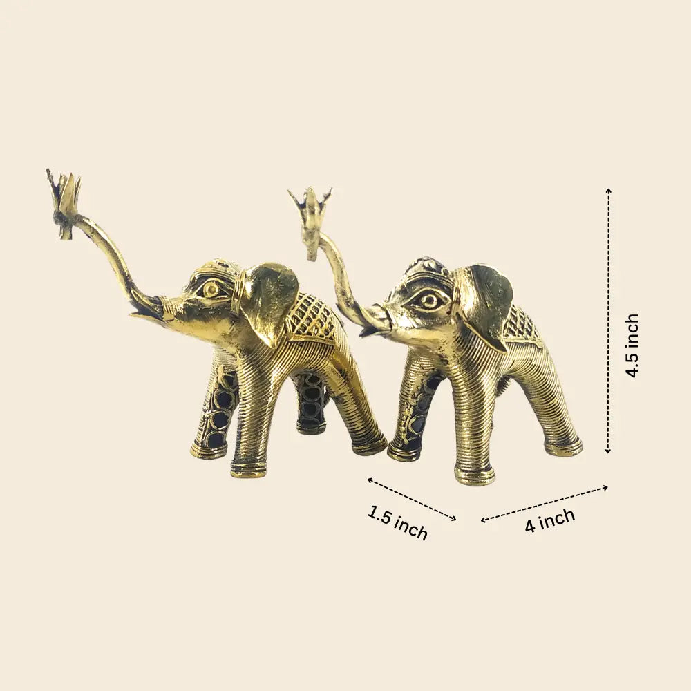 Solid brass elephant pair with raised trunk showing size and dimensions, handmade dhokra art figurines