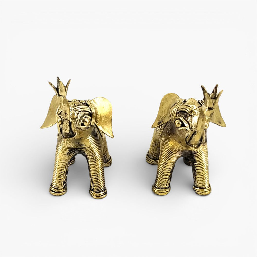 Handmade brass elephant pair with expressive face and raised trunk, traditional dhokra art statue