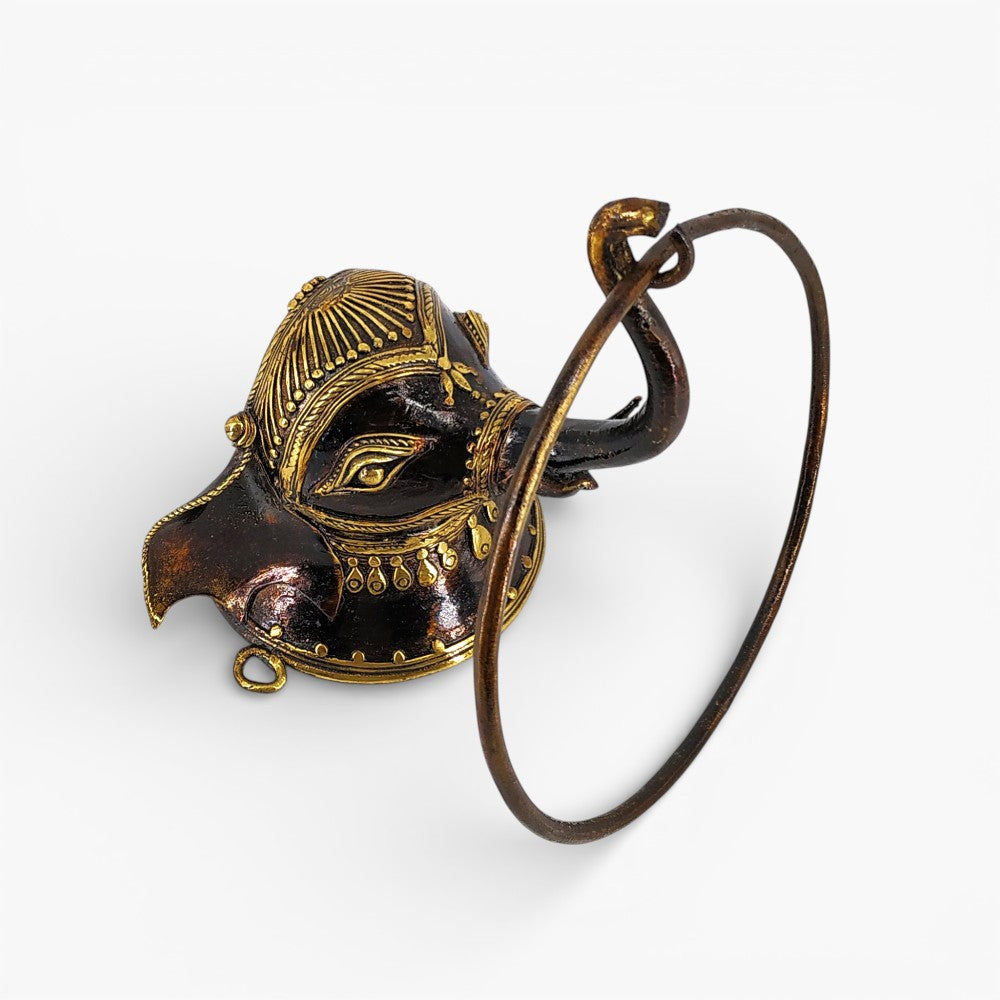 Side view of brass elephant towel ring wall décor