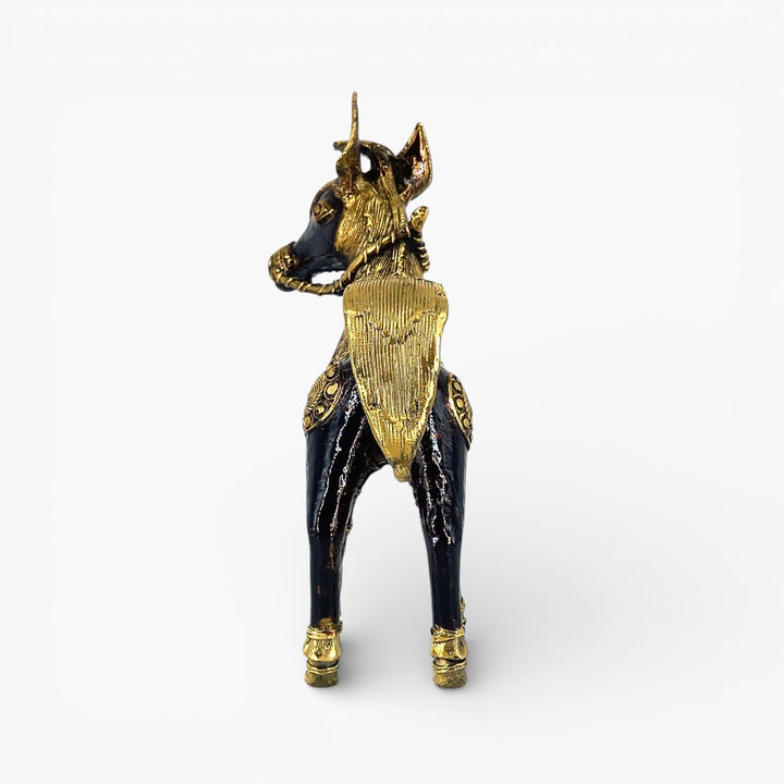 Rear view of black brass horse sculpture with detailed tail
