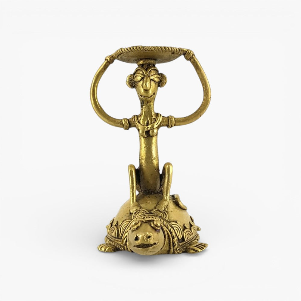 Front view of brass monkey turtle candle stand