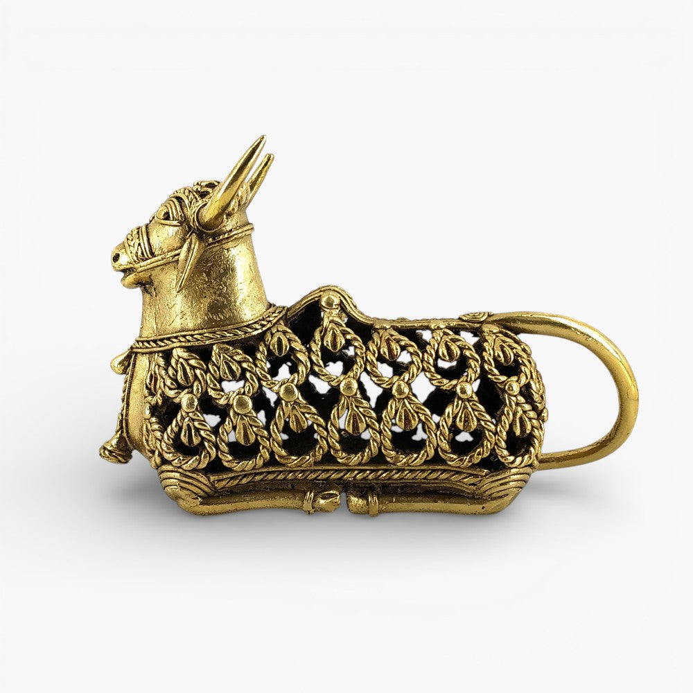 Side view of handcrafted brass Nandi sitting statue showcasing detailed jali lattice work and traditional Bastar Dokra art