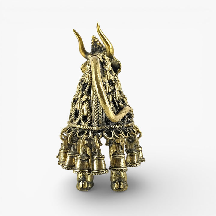 Rear angle of bell-adorned brass Nandi figurine