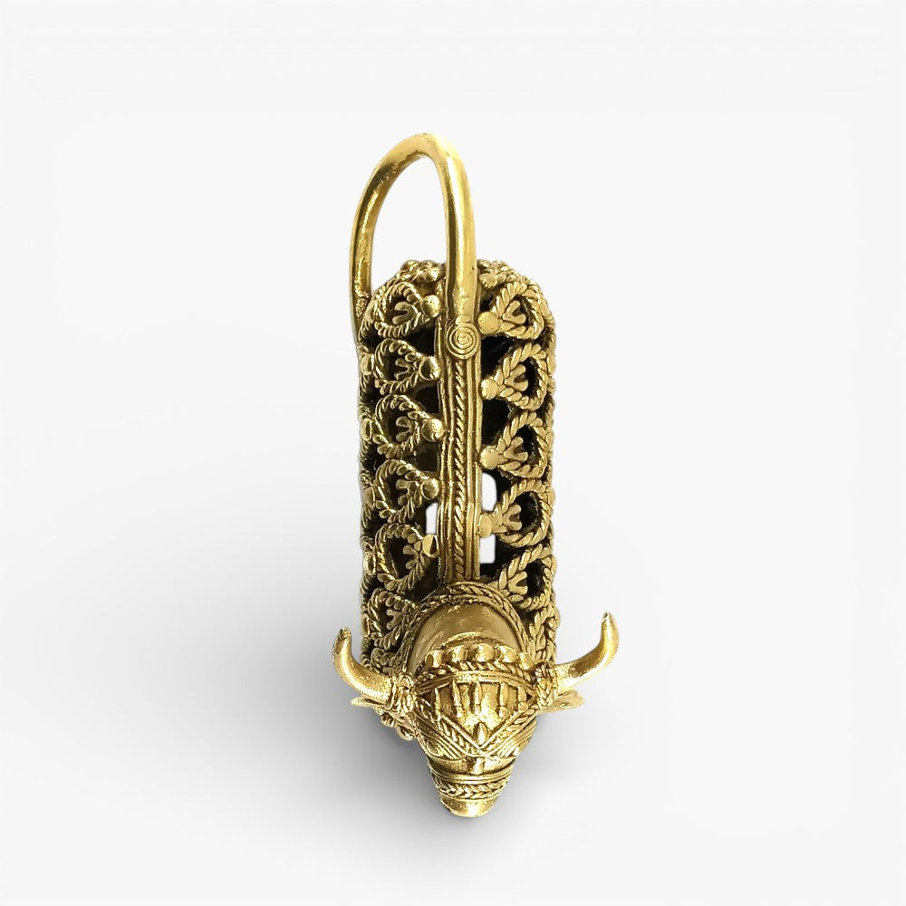 Top view of handcrafted brass Nandi statue emphasizing intricate jali craftsmanship and traditional metal art finish