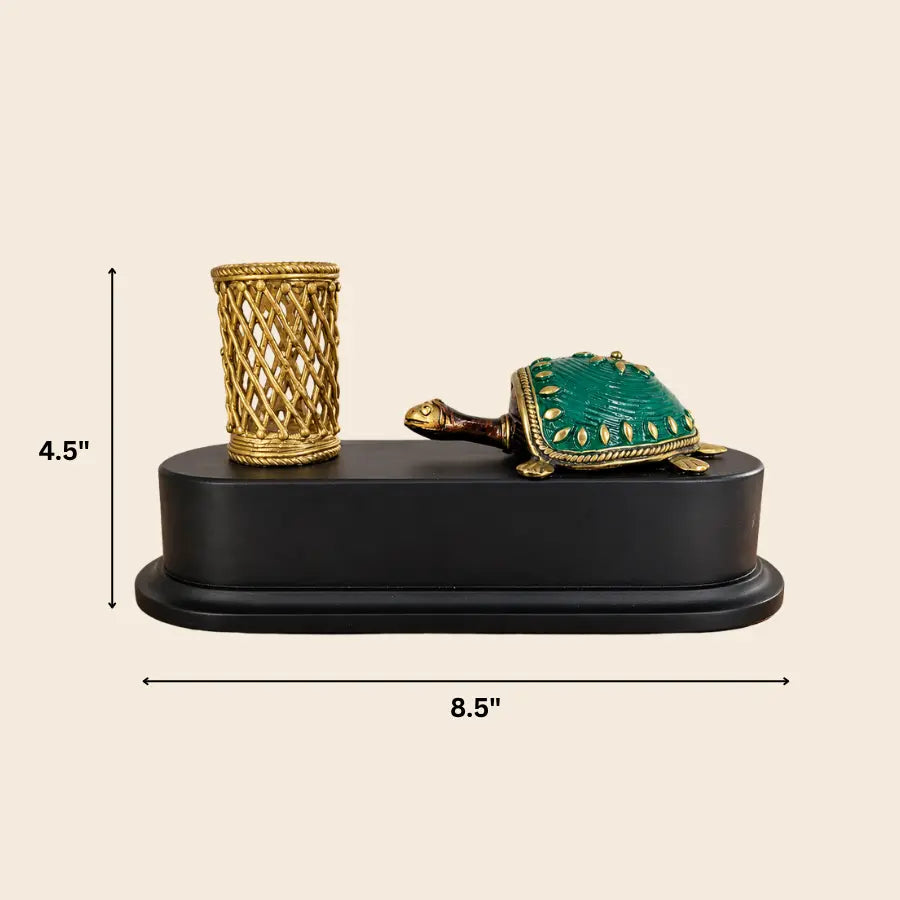 Bastar Dhokra brass tortoise pen holder desk organiser on black wooden base, approximate dimensions 8.5 inch width x 4.5 inch height