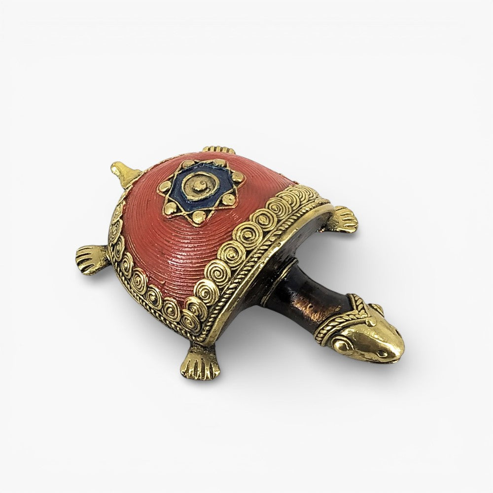 Coin motif tortoise bell metal artisanal décor piece