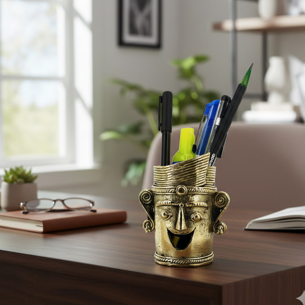 Crowned Smile Bastar Dokra art brass pen holder with expressive face design, golden finish handcrafted desk accent for office or study, 3.5 inch
