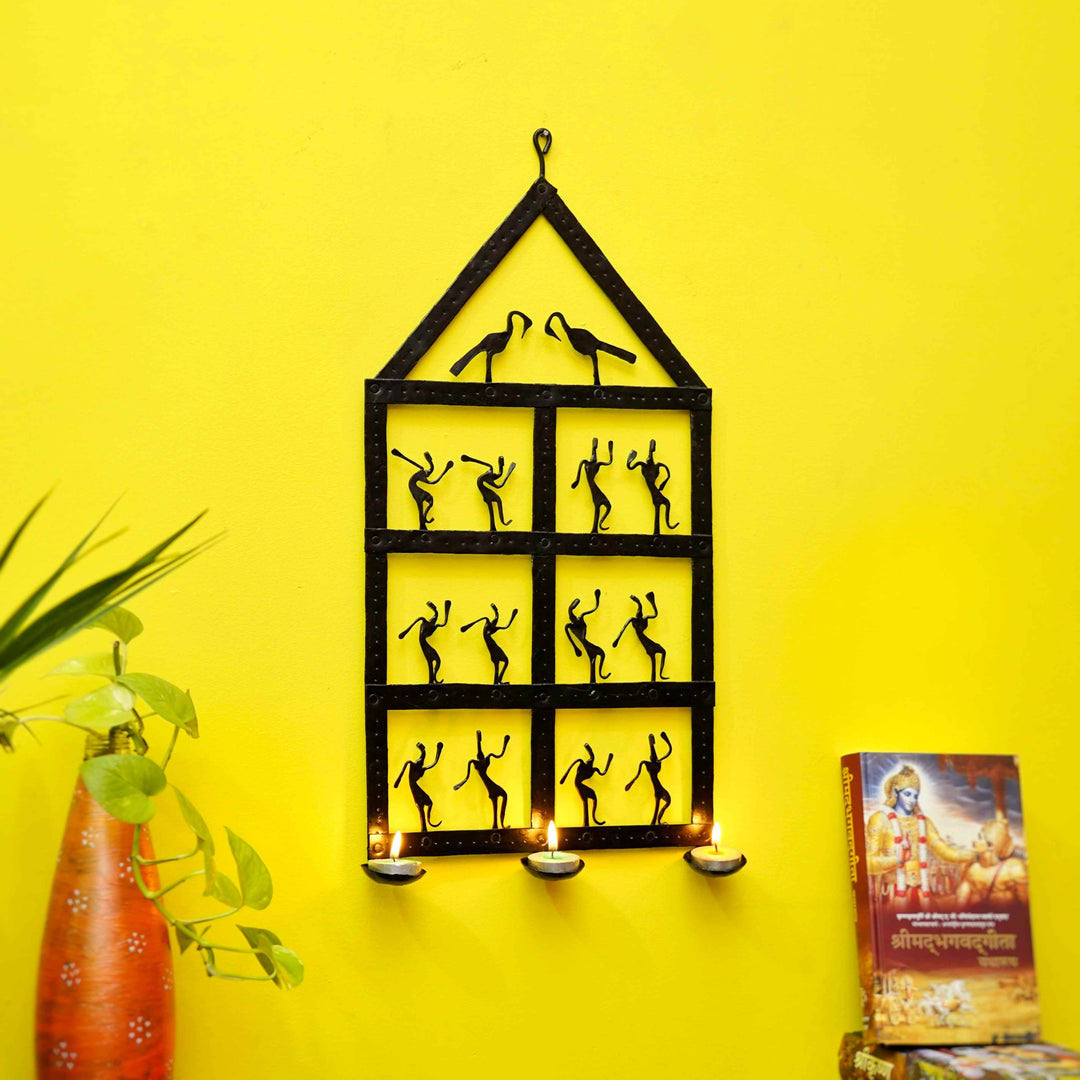 Handcrafted iron house wall hanging with tea light holders front view