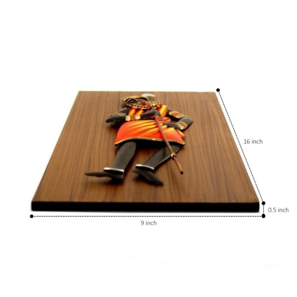 Angled view of Bastar iron craft dancing tribal woman wall art showing wooden base thickness and overall handcrafted structur