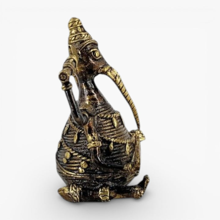 Side profile of Dhokra brass Ganesha idol in bronze color displaying sculptural form and traditional bell metal art style