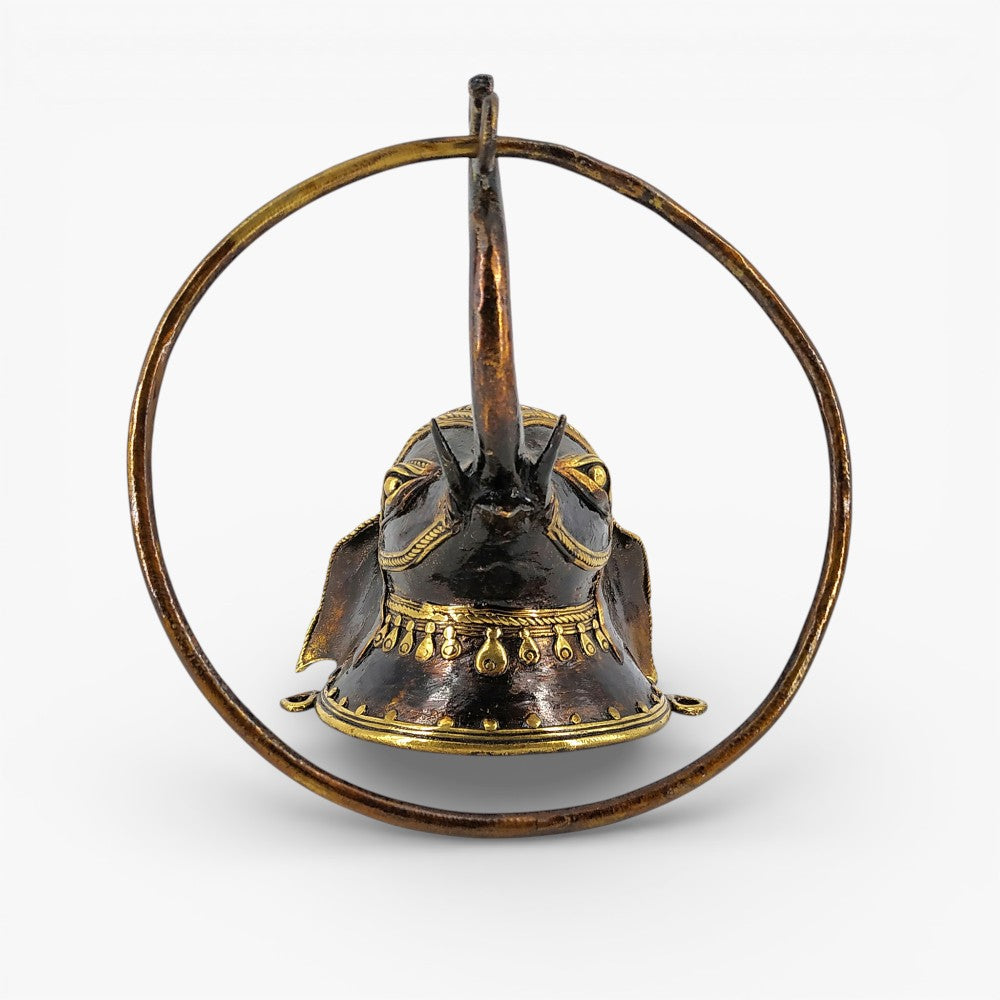 Close-up of elephant head detailing in Dokra brass art