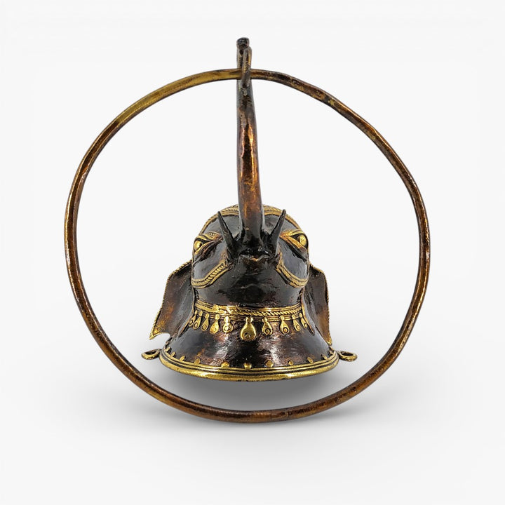 Close-up of elephant head detailing in Dokra brass art