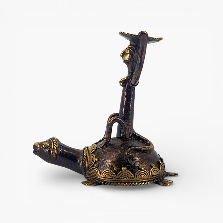 Side view of brass monkey tortoise candle holder
