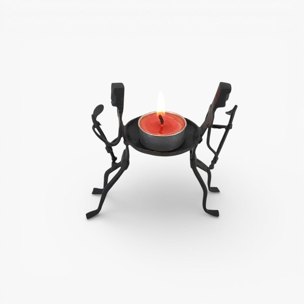 Black iron handcrafted candle holder with two human figures