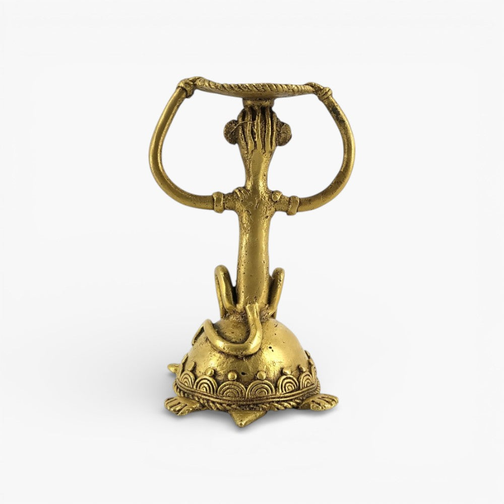 Back view of handcrafted brass candle holder décor