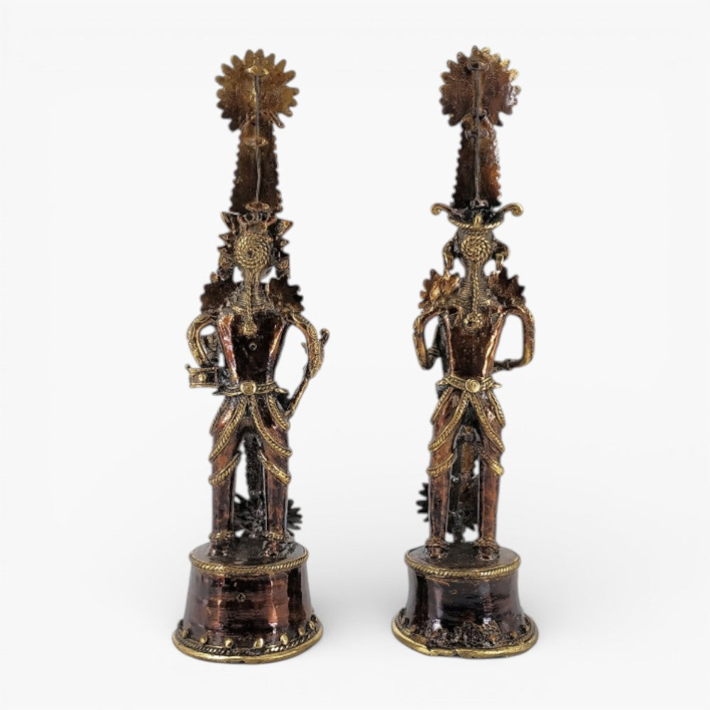 Back view of handmade Jhitku Mitki brass tribal statue pair showcasing detailed Dhokra metal casting and artisan finish