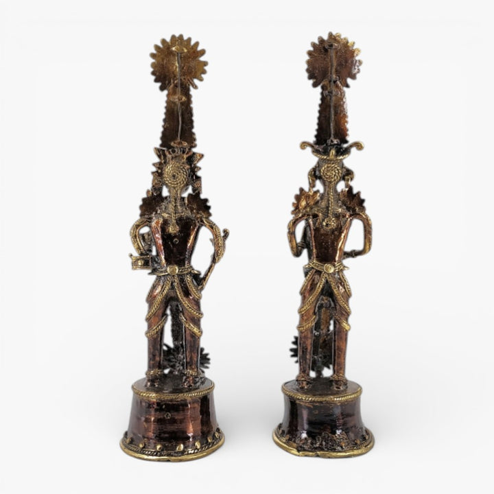 Back view of handmade Jhitku Mitki brass tribal statue pair showcasing detailed Dhokra metal casting and artisan finish