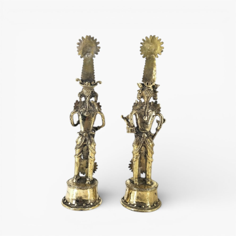 Back view of handcrafted brass Jhitku Mitki tribal statues showcasing detailed Dokra metal casting and traditional ornamentation