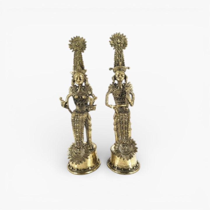 Complete pair of Jhitku Mitki brass tribal statues standing together representing Bastar folk love story in Dokra art